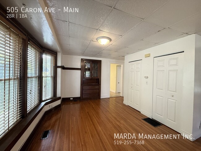 Building Photo - CHARMING 2 BED/1 BATH MAIN FLOOR UNIT W/ DRIVEWAY + 60% OF UTILITIES!
