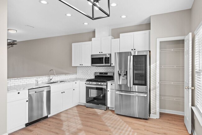 Building Photo - Available Now! Updated 4 bed, 3.5 Ba in Ca...