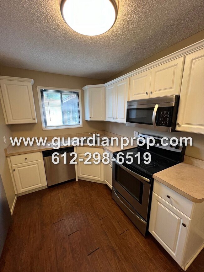 Building Photo - Coon Rapids Townhome Available Now, Open F...