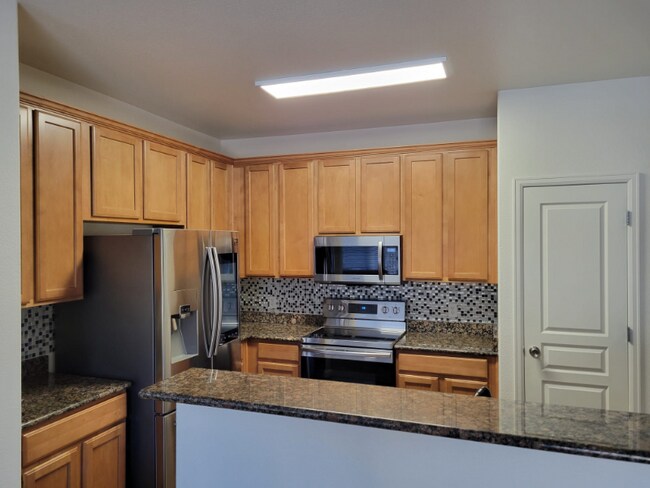 Building Photo - 837 E 98th Ave