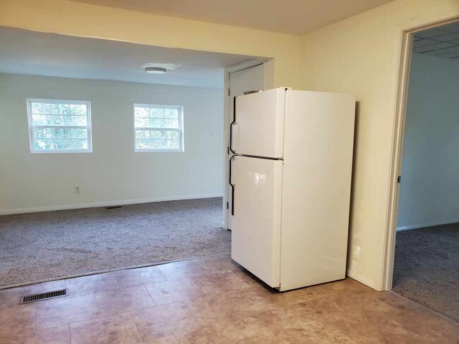 Kitchen looking into Back Room/Bed Room - 25 Maple St