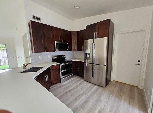 Building Photo - 9901 NW 51st Ln