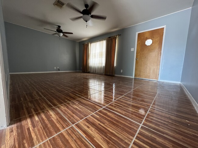 Living room from another angle - 271 W County Road 2140