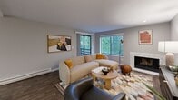 Located at 775 Cascade St in Oregon City, Oregon, this 2-bedroom, 1-bathroom residence offers a well-organized, single-level layout with a thoughtful mix of comfort and functionality. A welcoming entrance hallway, finished with rich wood-look flooring and neutral walls, leads into the heart of the home. The combined living and dining area is generously proportioned, anchored by a classic fireplace and framed by large windows and a sliding glass door that open to a private balcony overlooking lush, mature greenery. The kitchen features gleaming marble-look countertops, ample cabinetry, and a convenient pass-through bar with seating, complemented by an adjacent pantry for additional storage. Both bedrooms are carpeted and bathed in natural light from well-positioned windows with wooded views. The primary bedroom offers a comfortable retreat, while the second bedroom includes mirrored sliding closet doors. Three closets throughout the unit provide excellent storage. The full bathroom is finished with wood-look tile flooring and includes a tub/shower combination. Additional conveniences include an in-unit laundry area. Neutral gray tones and consistent flooring create a cohesive, modern aesthetic throughout this inviting Oregon City residence.