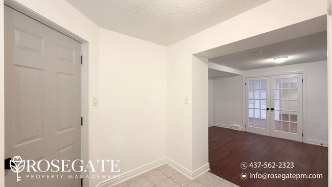 Building Photo - Brand New 1-Bedroom + Den Basement Unit in...