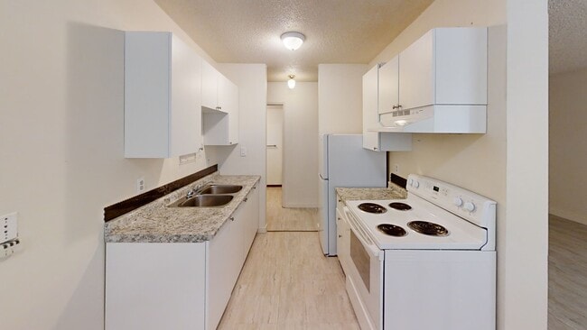 Building Photo - 9515-9100 100 Ave.