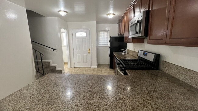 Photo - NO RENT DUE FOR DECEMBER - Updated interior - must see!  Parking On Site - Laundry On Site Apartment