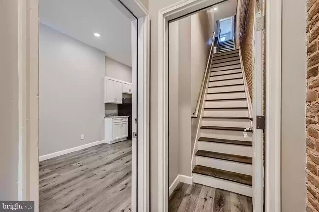 Hallway between Unit 1 (left, already occupied) and Unit 2 (right, this listing for rent) - 515 Mosher St