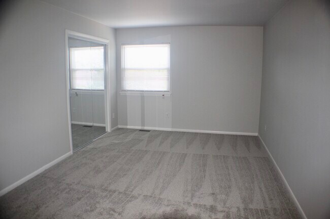 Rear bedroom with closet - 3836 Ocean Tides Dr