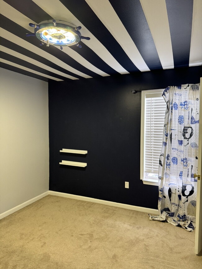Building Photo - Room for rent - includes all utilities, in...