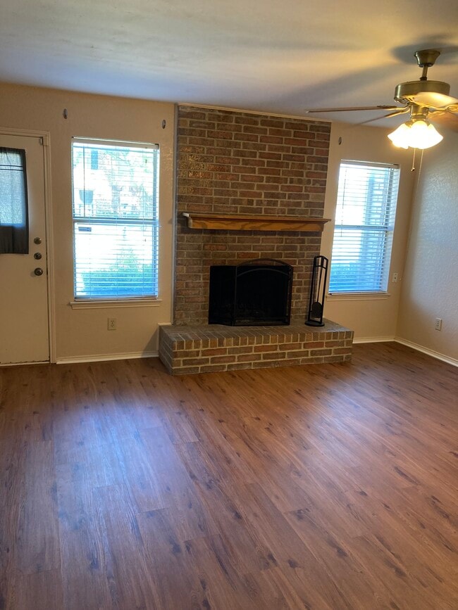 Living room and fireplace - 505 Pecan Acres Ct