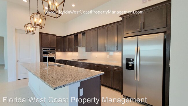 Building Photo - 3 br, 3 bath House - 8158 Redonda Loop