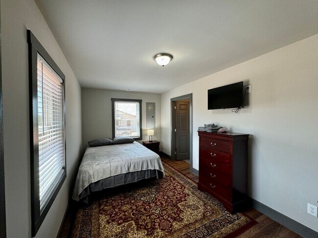 Building Photo - New Construction-Fully Furnished & Utilities Included