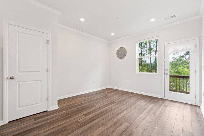 Building Photo - Charming 3-bedroom, 3.5-bathroom townhouse located in the heart of Durham, NC!