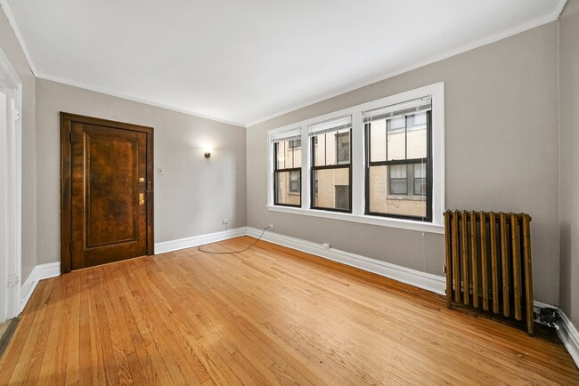Building Photo - Sunny, Convertible Studio with Two Rooms a...