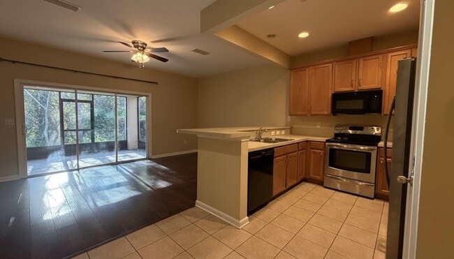 Building Photo - Gated Townhome in Bartram Park. Screened in Lanai overlooking a Nature View. Reduced Application ...