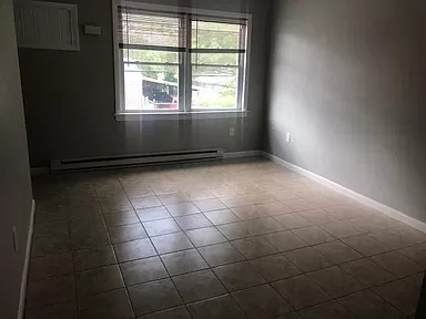 Building Photo - Renovated Townhouse with Garage