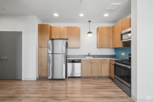 2 habitaciones, 1 baño - 707 pies cuadrados - Cocina - Indy Street Flats