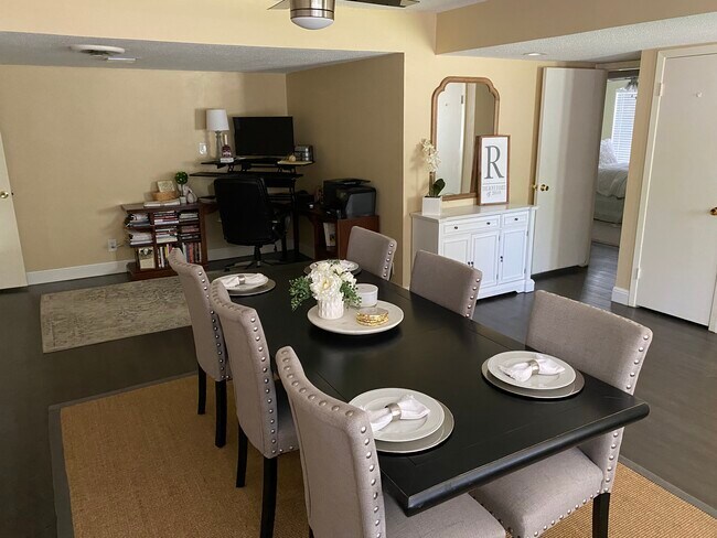 Front living room with dining room setup - 3006 Cedarlawn Cir