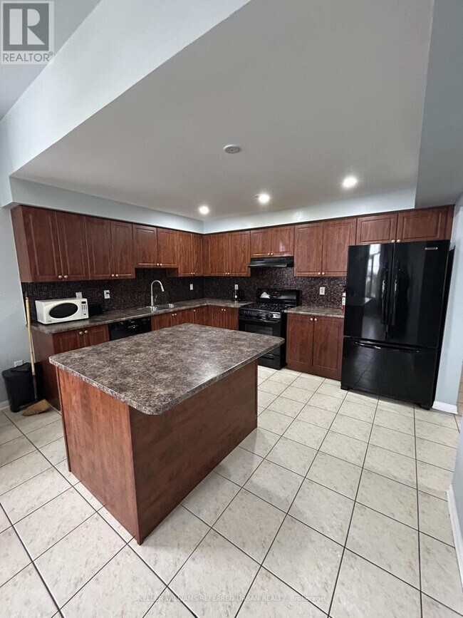 Photo du bâtiment - 52 Commuter Dr