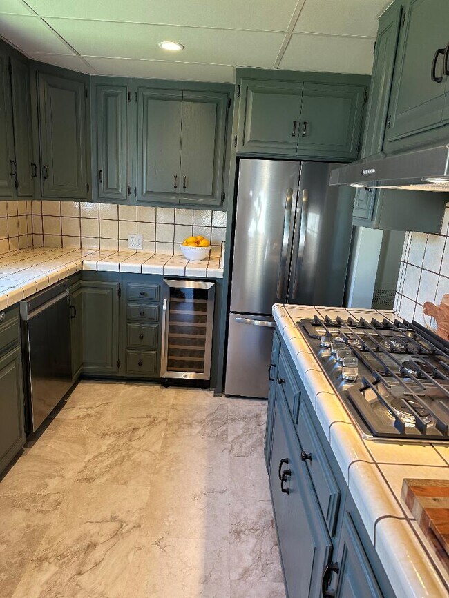 Large kitchen with all new appliances. - 216 E 45th St