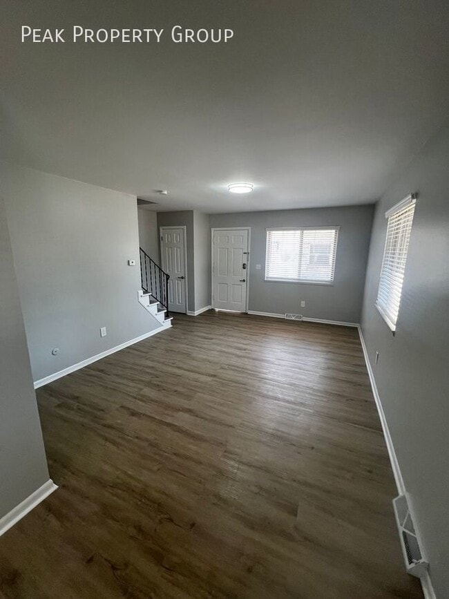 Building Photo - Available in July! 2 Bedroom Townhome Loca...