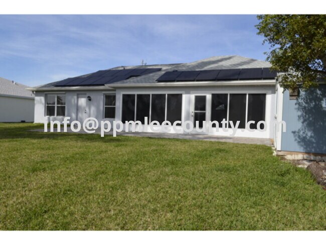 Building Photo - Electric Solar Panels on a Freshwater Cana...
