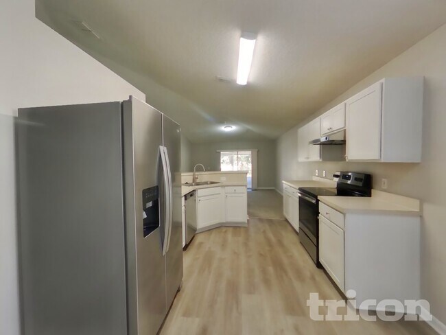 Building Photo - 7439 Lawn Tennis Ln