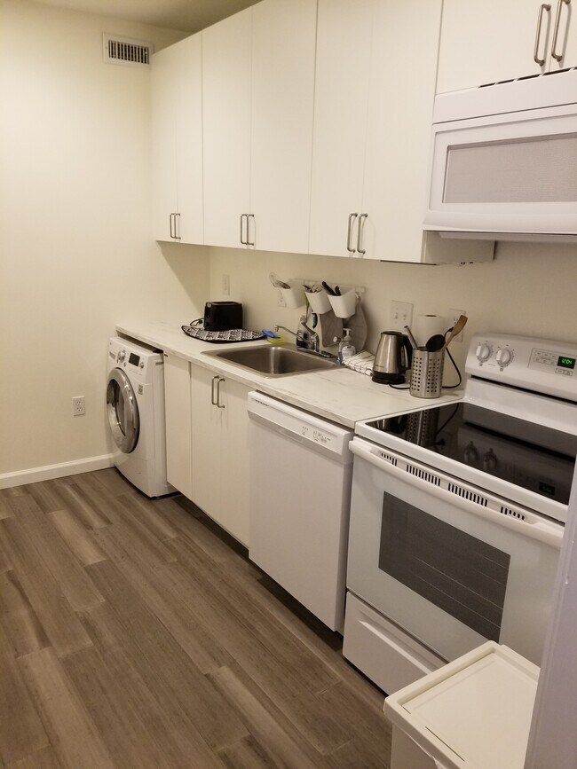 new kitchen with washer/dryer - 7610 Carteret Rd