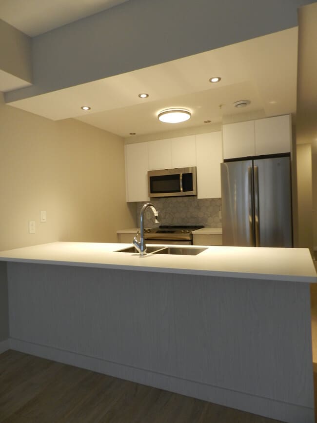 Building Photo - WELCOME TO THE UPSIDE - ONE BEDROOM PLUS DEN APARTMENT AVAILABLE