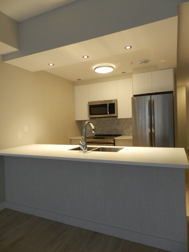 Photo du bâtiment - WELCOME TO THE UPSIDE - ONE BEDROOM PLUS DEN APARTMENT AVAILABLE