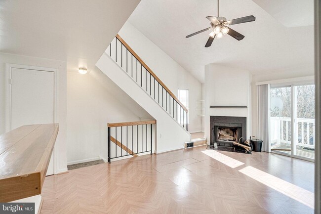 Building Photo - This two-bedroom, two-bathroom condo becko...