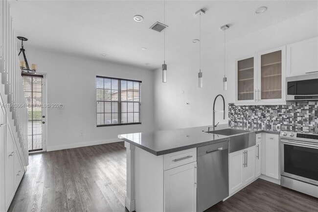 Photo - 624 Southwest 147th Avenue, Pembroke Pines, FL 33027 - 2 BR 2.5 BA townhouse