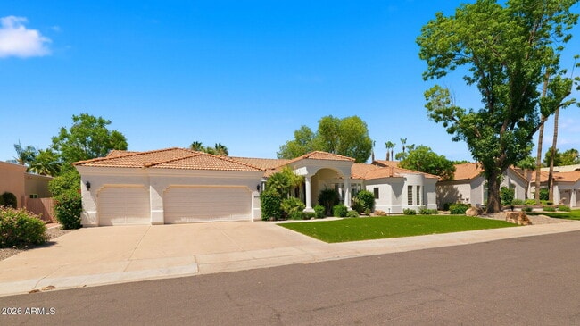Building Photo - 8638 E Dahlia Dr