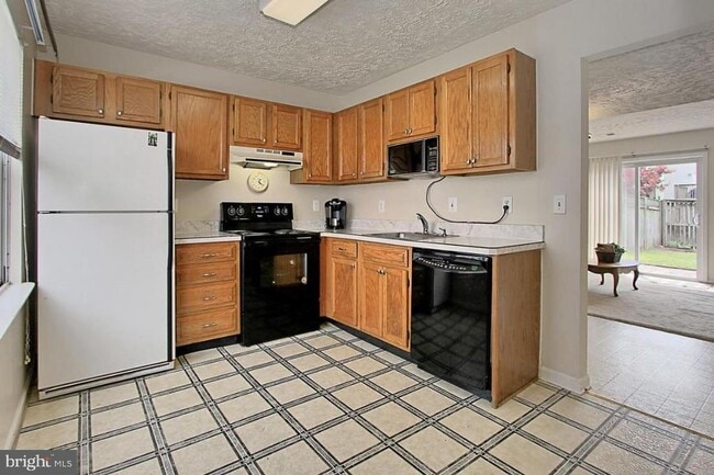Building Photo - 8607 Woodhue Ct