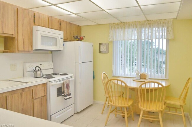 Building Photo - Available for Summer 2022 - Clean and Spacious Condo in Naples Sunrise -- $1,250/month