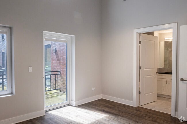 3BR,2BA - 1,405SF Primary Bedroom - 3833 N Broadway St