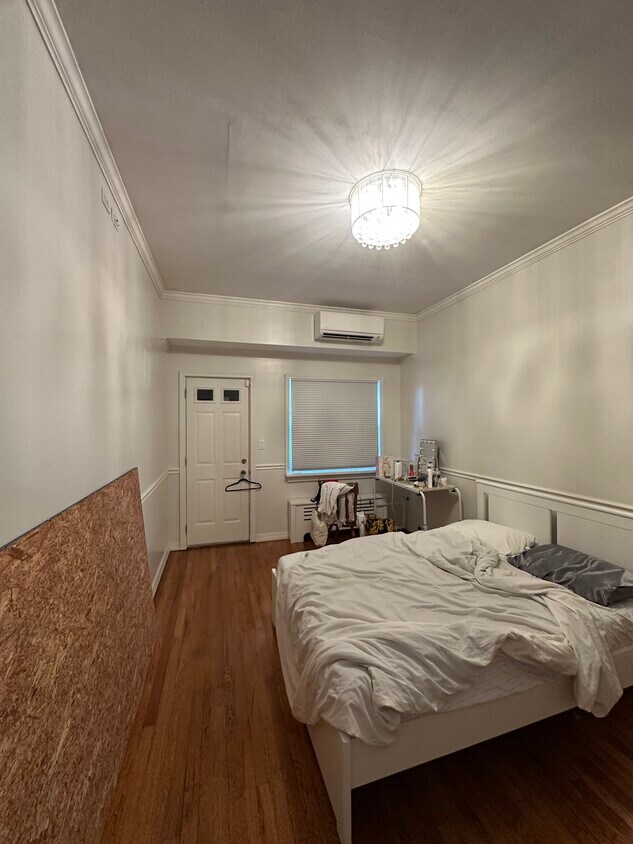 Master bedroom with walk in closet and 2 small stThat board is just there as storage, will be remove - 2370 Brigham St