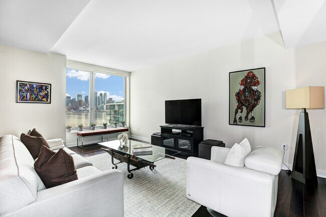 Great Room with Unobstructed Riverfront Views - 1000 Avenue At Port Imperial