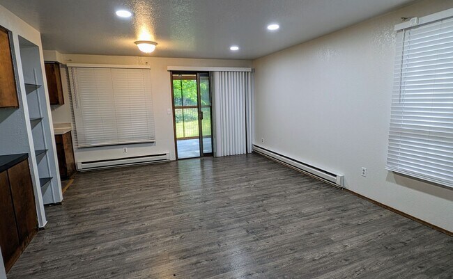 Building Photo - Rambler Style Duplex with Garage & Carport