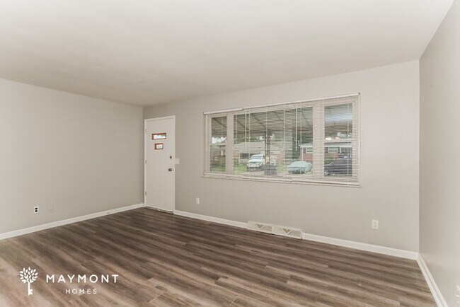 Foto del edificio - Charming 3-Bedroom Brick Home