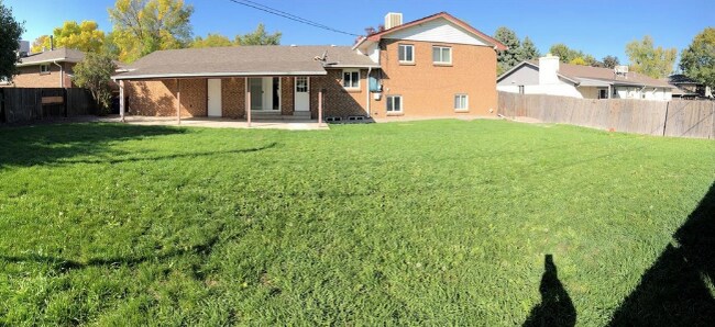 Backyard, wood fence for privacy - 2182 S Harlan St