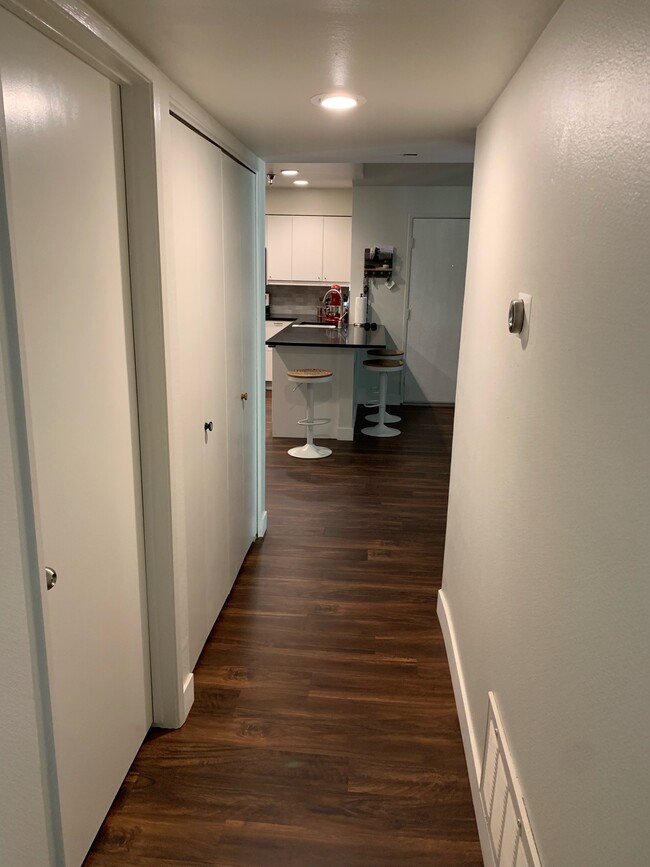Hallway - inbuilt washer dryer (left) , NEST thermostat ( right) - 17161 Alva Rd