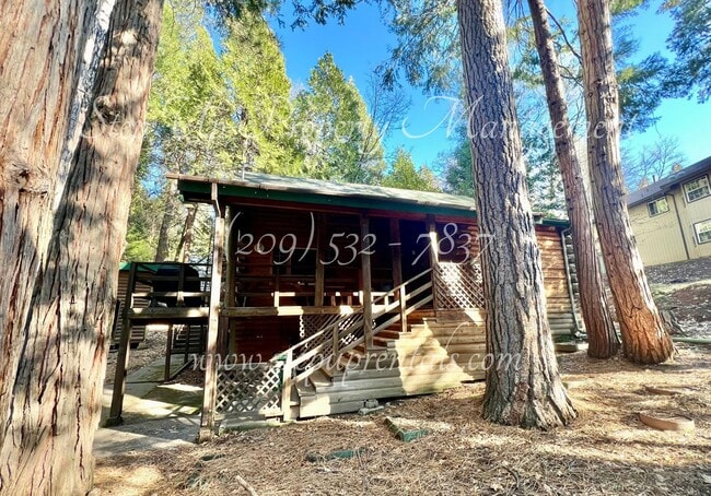 Building Photo - Rustic Retreat: Charming 1-Bedroom Log Cab...