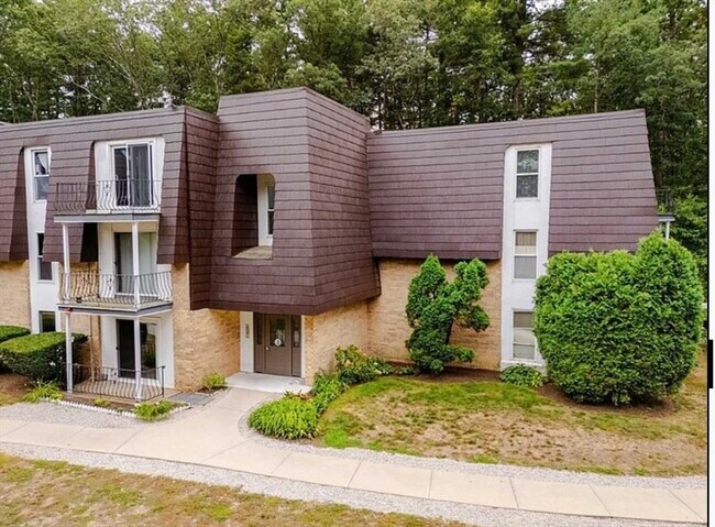 Foto del edificio - 8 Shadowbrook Ln