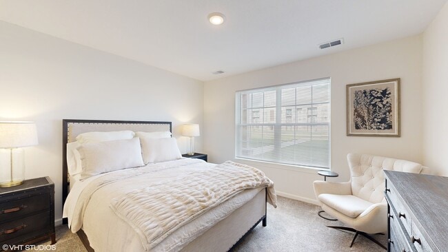 2 BR, 2 BA Deluxe - First Bedroom - The Arcadian Apartments