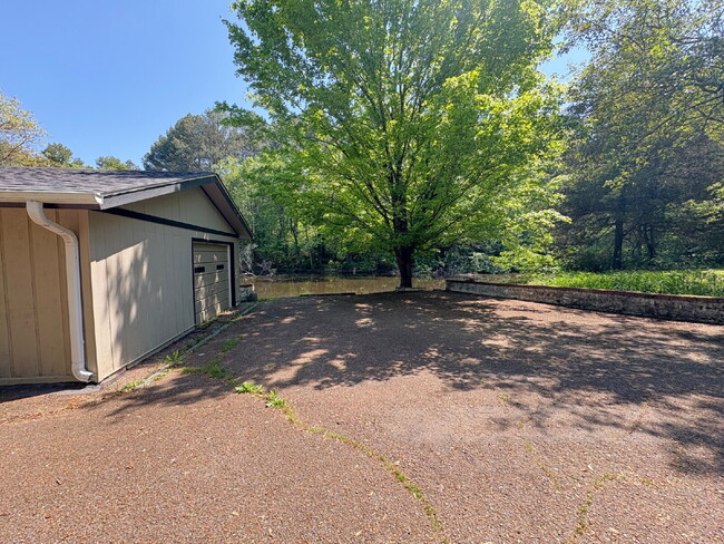 Building Photo - "Charming 3-Bed Oasis with 2 Full Baths in...
