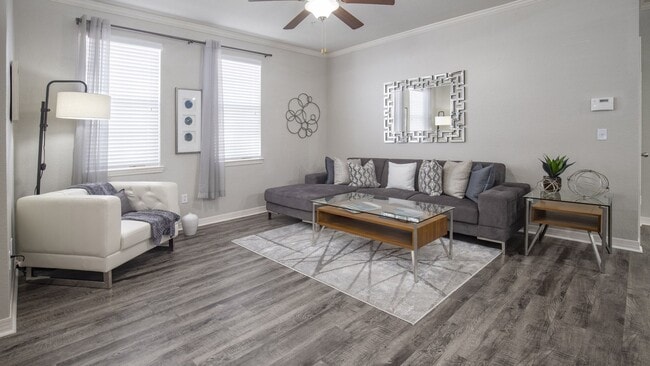 Cozy Living Room with Stylish Sectional Sofa and Statement Mirror - Enders Place at Baldwin Park