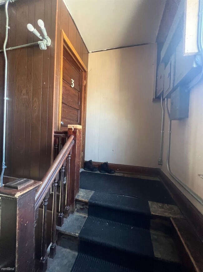 Foto del edificio - 2 br, 1 bath Triplex - 704 Blue Earth St