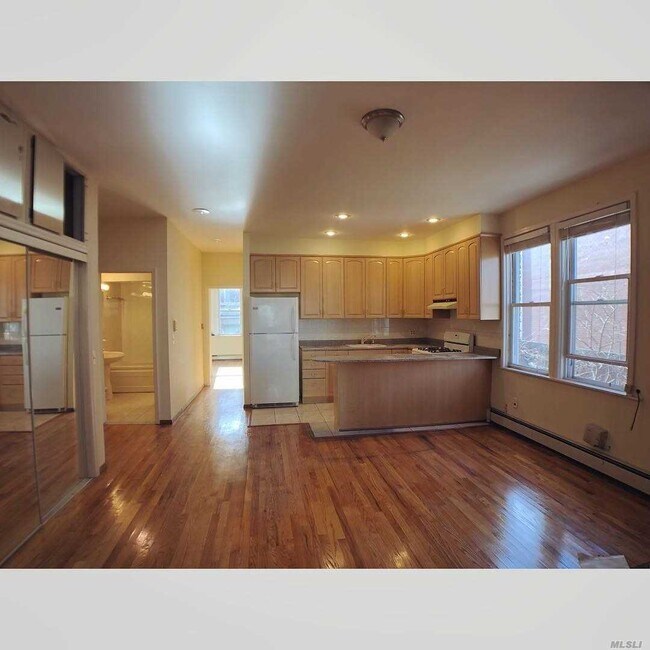 Building Photo - 108-42-108-48 48th Ave